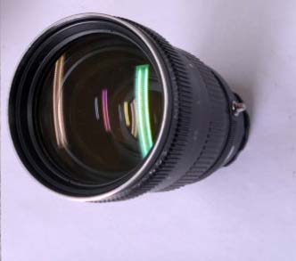 Objetivo Rokkor Autozoom 10-100mm 1:3.5 con funda y caja